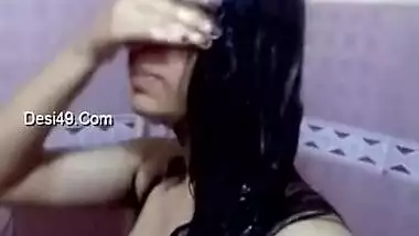 Wet Indian housewife shows her XXX-shaped body in the shower cabin