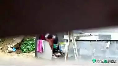 Neighbor on a hidden camera caught aunt taking a bath on the outdoor naked