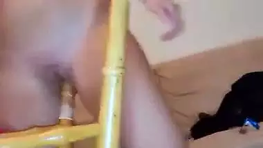 Crazy wild girl fucks her pussy with a chair leg