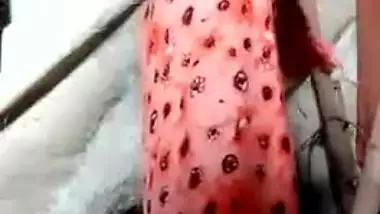 Beautiful Desi slut takes off red saree to reveal her slim XXX body