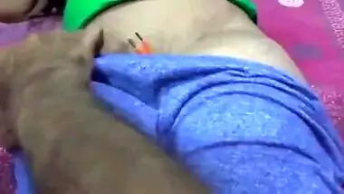 Young Desi woman is lying in bed but cameraman is touching her XXX body