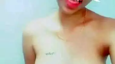 Naked webcam porn model shows her Indian face with a cute filter on