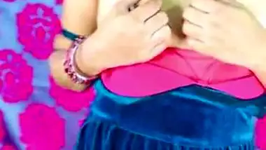 Indian lady in blue dress with her dildo