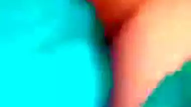Horny girl squeezes her boobs and fingers her hairy pussy