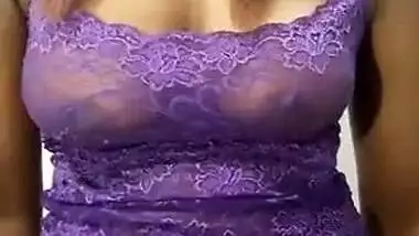 krisha in violet top pressing her boob and talking