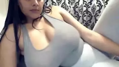 Busty Indian teen shaking massive tits in webcam