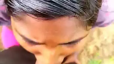 Horny village girl gives a blowjob outdoors in desi porn