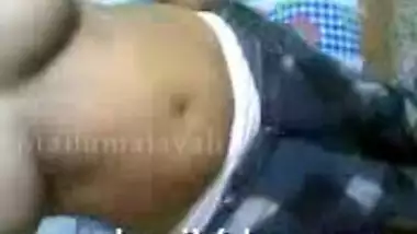 Busty indian girl Poorna in pink bra changing in her bedroom