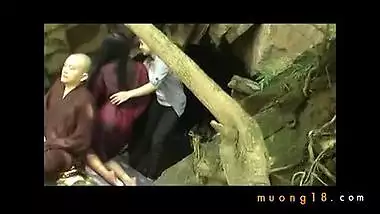 Buddhist monk doing tantric sex in outdoor cave