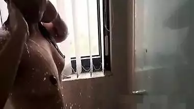 Indian girl with sexy nipples doesn't mind taking shower on camera