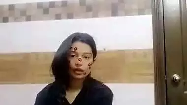 Indian nude MMS of a sexy girl fingering in her bathroom