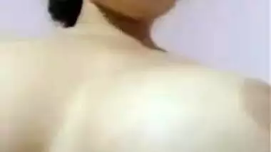 Indian girl poses with naked XXX breasts and licks her sex nipples