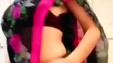 Indian mom in carnival sari moves body and slowly strips down on cam