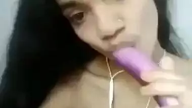 Skinny Desi girl masturbating pussy with brinjal