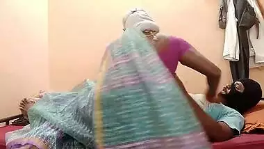 Masked Desi with pleasure rides cock on the bed after XXX blowing