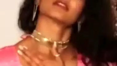 Sexy Desi woman takes XXX pink sari off exposing her sex appealing body