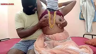 Mustached man in a mask and Desi XXX partner have sex on the camera