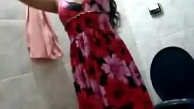 Indian showing off in bathroom