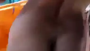 Horny nude desi girl pisses on camera before a bath