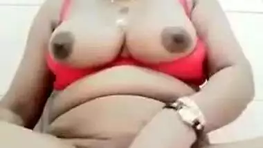 Fat Desi auntie sticks cucumber into pussy to satisfy her XXX needs