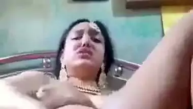 Newly married nude desi lady fucks her pussy with a banana