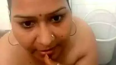 Horny Desi Bhabhi Bathing And Masturbating