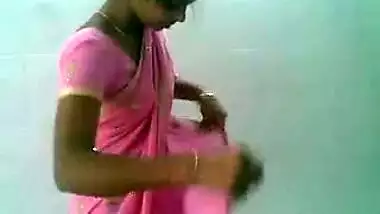 housewife in pink sari stripping naked
