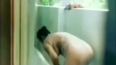 A chubby Desi aunty bathing outdoor nude on cam for her lover XXX video