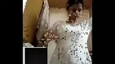 Indian girl doesn't hide boobs from camera while changing clothes