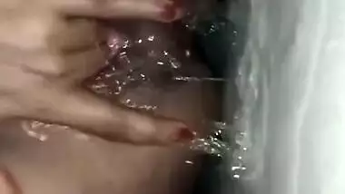 Horny bhabhi masturbating and squirting in bathroom, husband recording