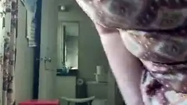 Indian aunty vacuuming